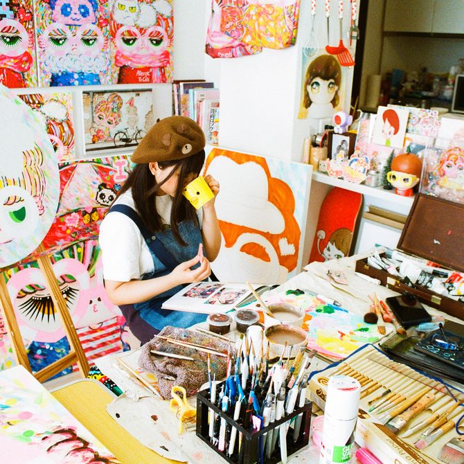 Bell Nakai sittting drinking tea in her studio
