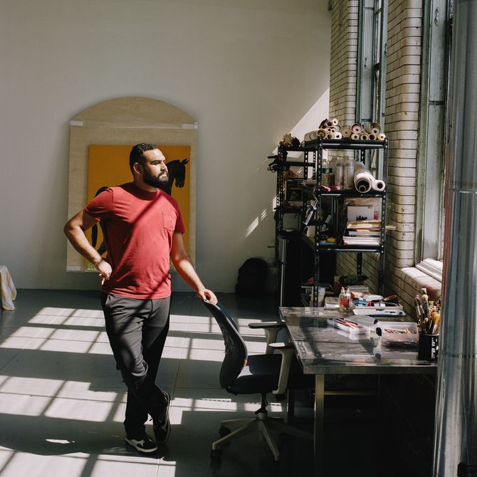 Bony Ramirez standing in his studio looking thoughtful
