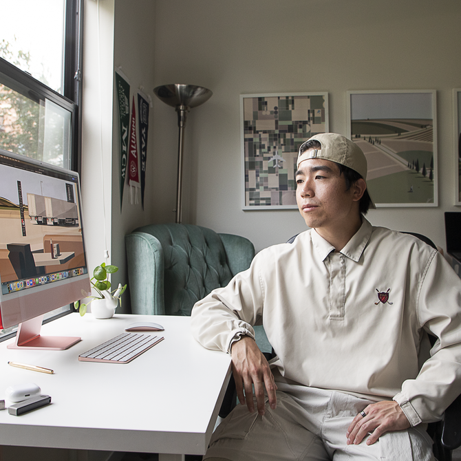 Grant Riven Yun sitting at his desk