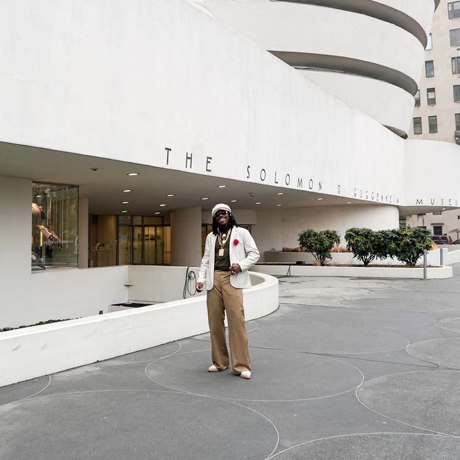 Mr StarCity standing outside the Solomon Guggenheim Museum in New York