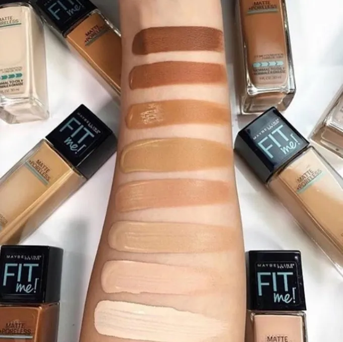 Many Color swatches of different maybelline foundation shades on a arm