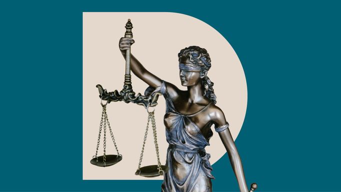 Image of cut out lady justice statue representing a fair settlement agreement
