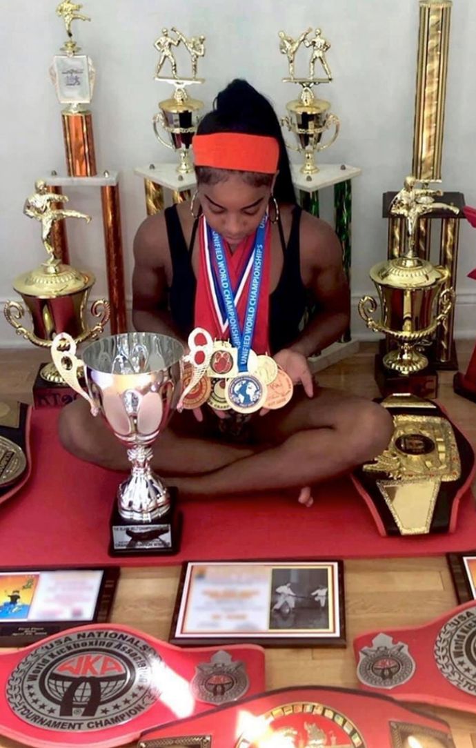 Rocky Harris With Many Martial Arts Medals