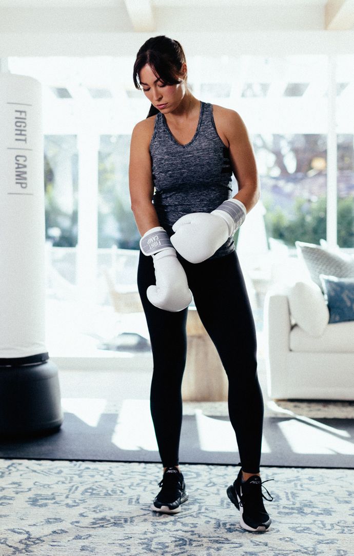 Boxer Putting On Boxing Gloves