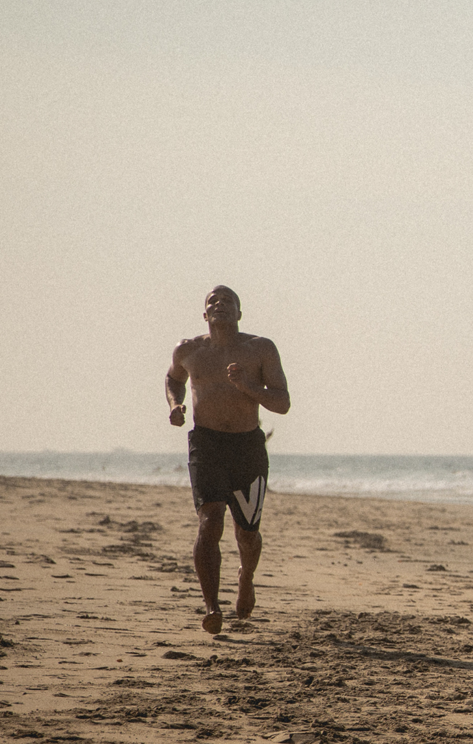 Flo Master Running On the Beach
