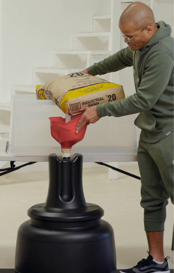 Filling The Base of a Heavy Bag With Sand