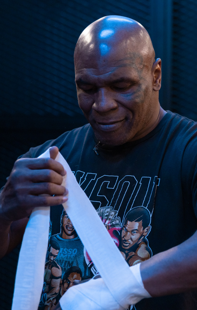 "Iron" Mike Tyson Putting on FightCamp Traditional Hand Wraps