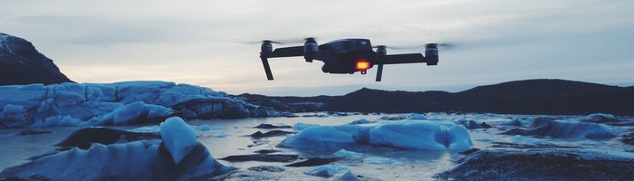 Flying drone above ice.