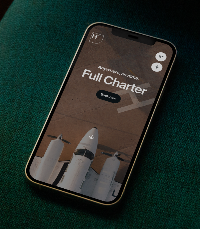 Hyer® website for private aviation displayed on a smartphone.