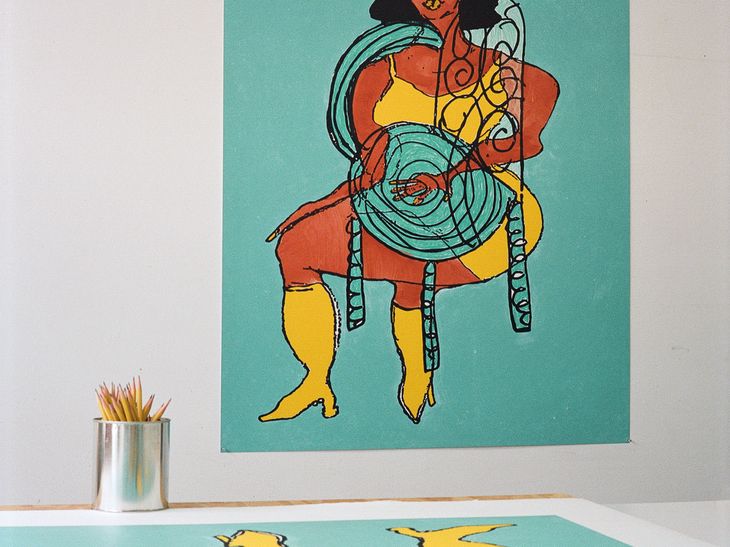 Tschabalala Self with her edition ‘Lady in Yellow on Spiral Seat #2 Teal Background’