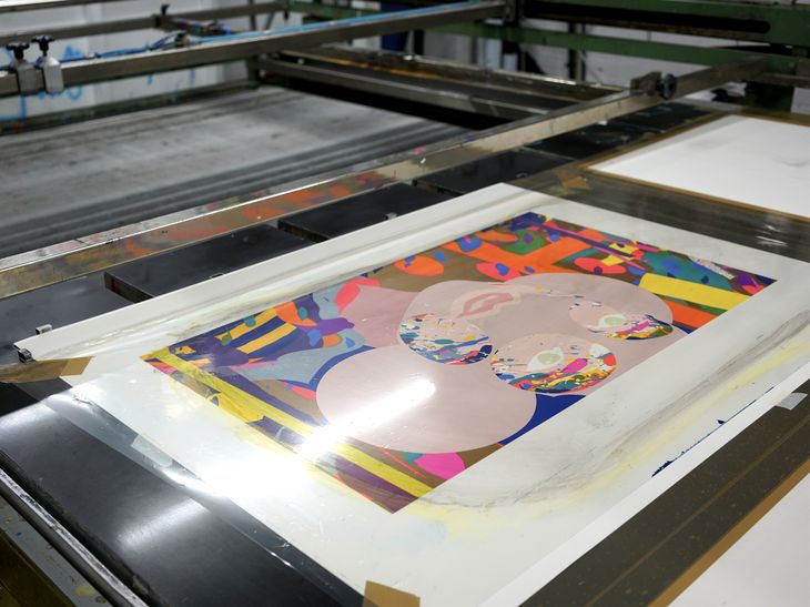 screenprint by Paul Insect in progress, with sections masked by adhesive tape