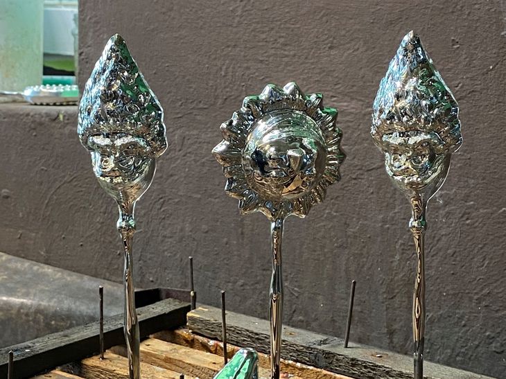 3 tests for bauble designs in a reflective chrome finish