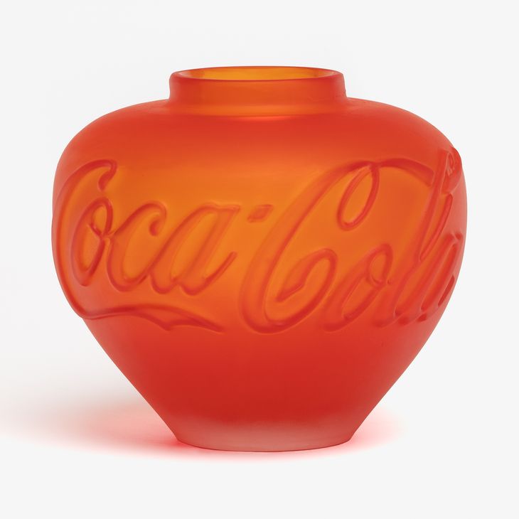 transluscent red vase emblazoned with Coca-Cola logo