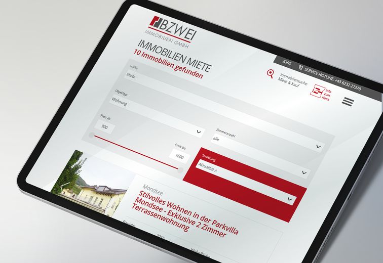 Tablet mit BZWEI Immobilien Webseite