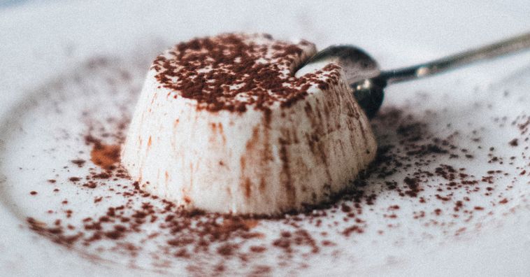panna cotta sprinkled with cocoa powder