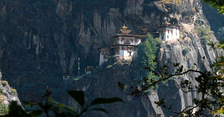 white temples in the Himalayas in bhutan 