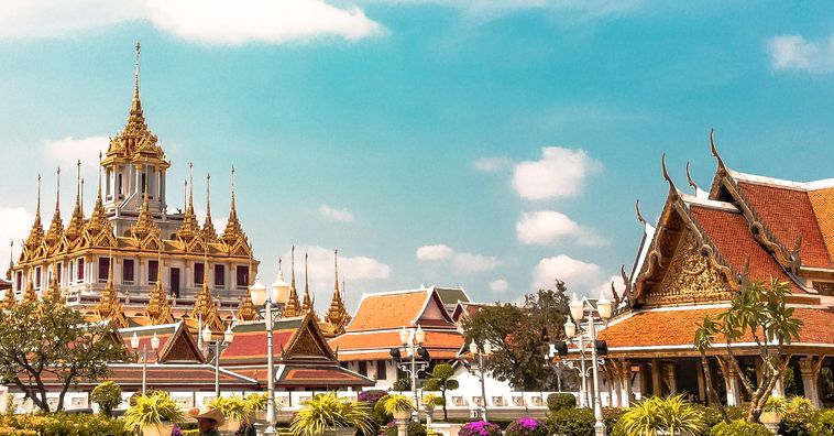 the golden grand palace in bangkok thailand on a sunny day
