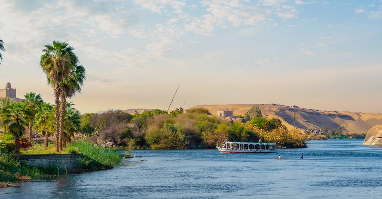 boat floating in the nile river in egypt on a sunny day