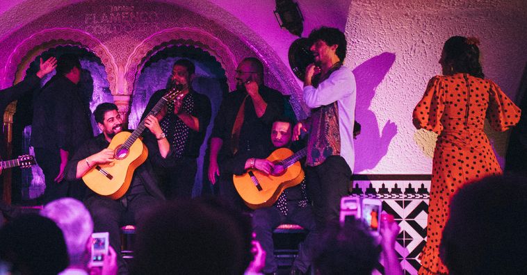 people in spain performing a flamenco show