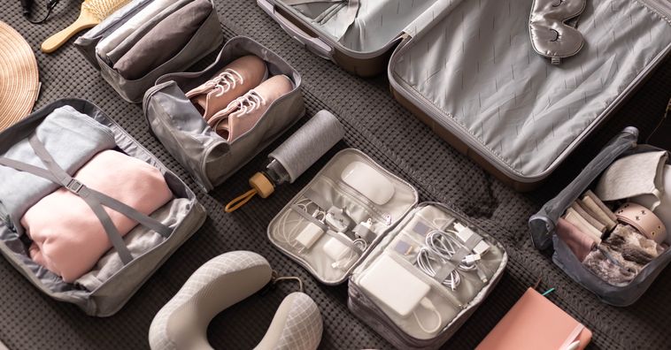 packing cubes filled with travel accessories