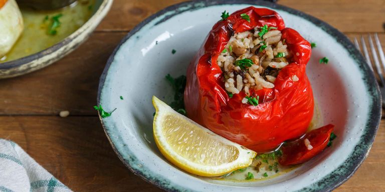 Gemista, a classic Greek food dish consisting of tomato, peppers, or zucchini stuffed with rice and herbs.