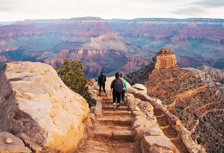 Travelers walking along a staircase at the Grand Canyon