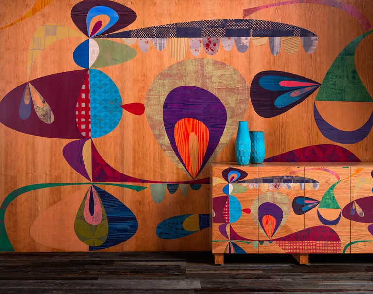 Colorfully painted wall with vivid patterns and imagery.