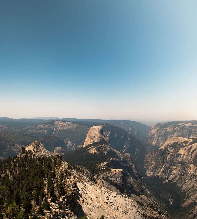The view of Half Dome from the top of Clouds Rest in Yosemite National Park.