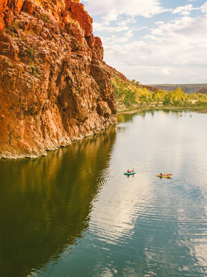 Two girls floating around Glen Helen