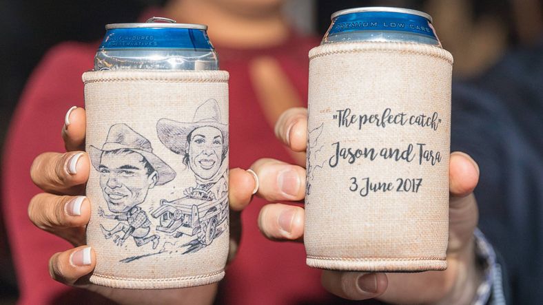 Stubby coolers with Tara and Jasons faces printed on them