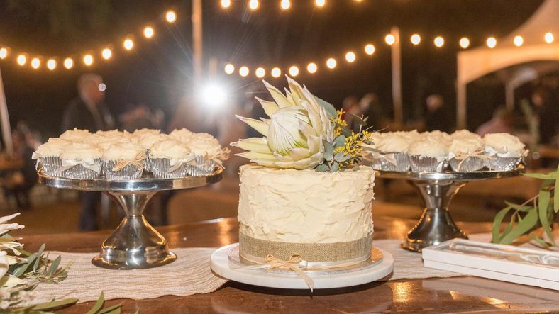 Wedding cake served on a table at Tara and Jasons wedding