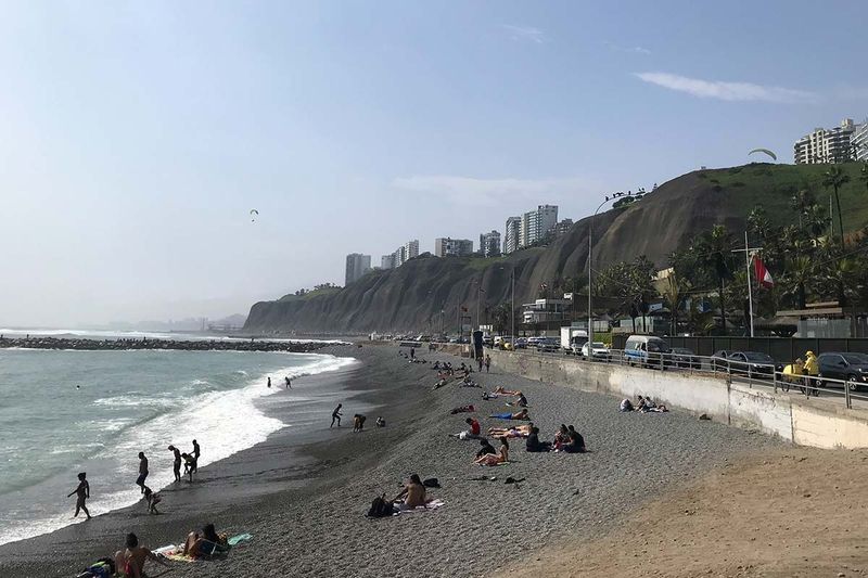 Relaxing on the beach in Lima, Peru