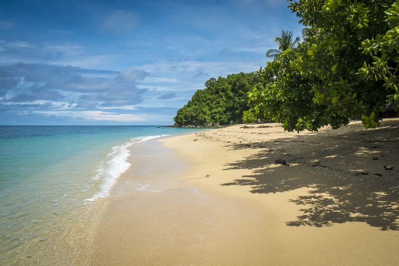 A long, sandy beach on Samal Island