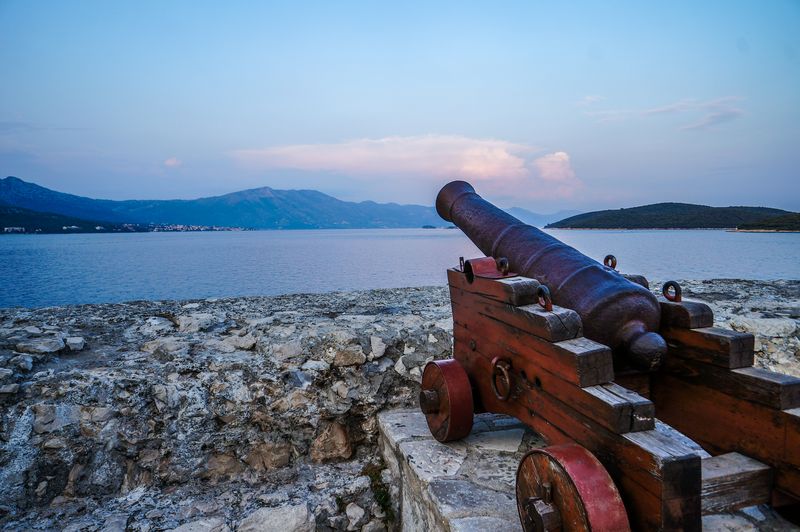 An old cannon facing out to sea in Korcula, Croatia