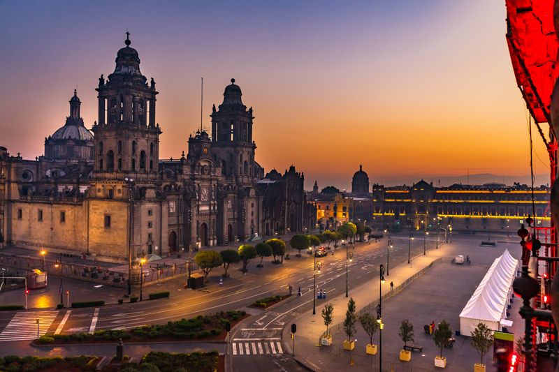 The Metropolitan Cathedral and Zocalo (main square) in Mexico City at sunrise