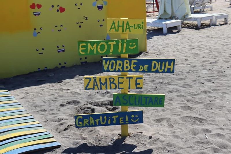 A sign on the beach in Vama Veche