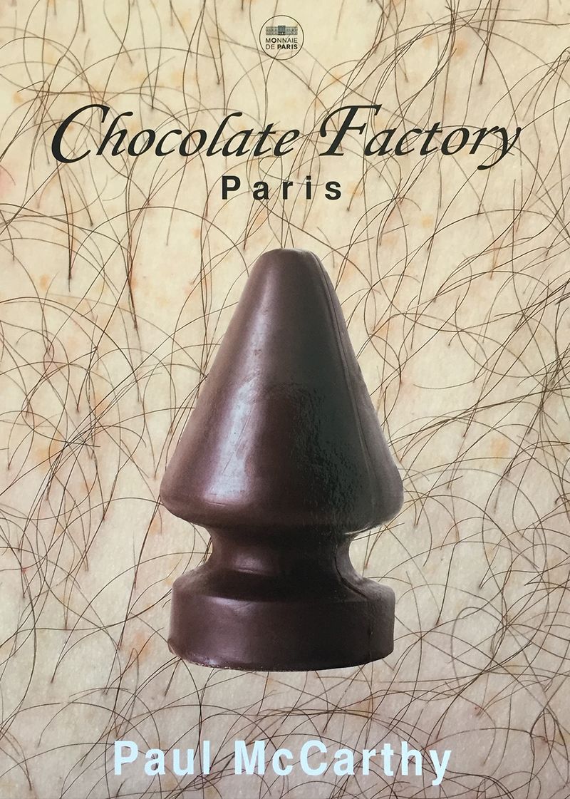 chocolate butt plug superimposed on pale skin with dark hair