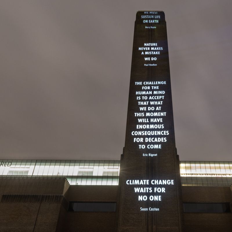 quote by Eric Rignot projected onto the Tate Modern, "The challenge for the human mind is to accept that what we do at this moment will have enormous consequences for decades to come."