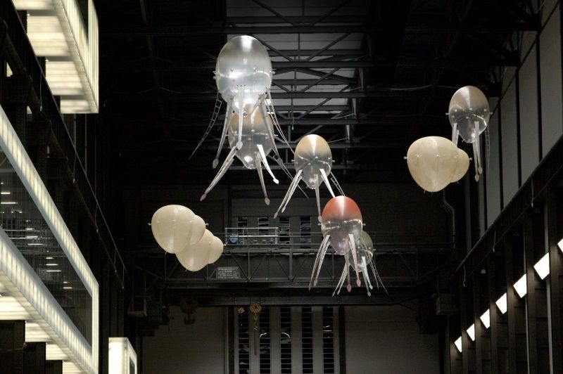 floating robot jellyfish in a large industrial interior