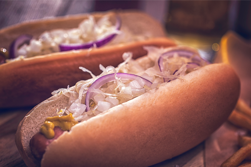 New York style hot dog with sauerkraut, onions and mustard