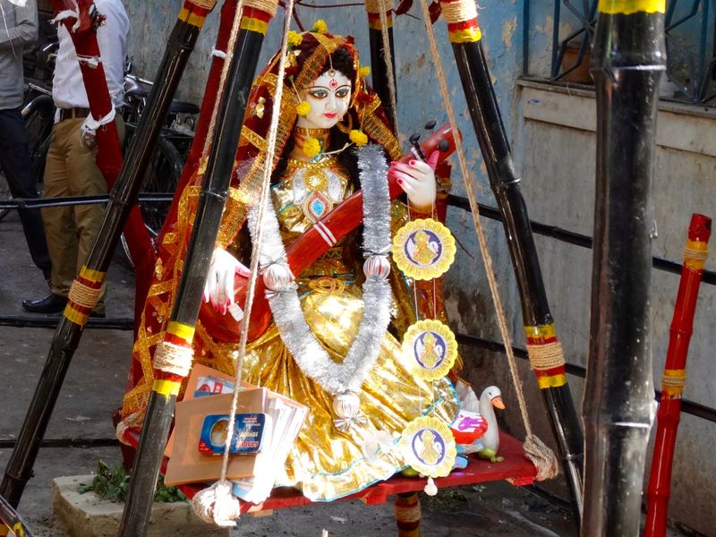 Goddess Saraswati dressed in a yellow sari for Vasant Panchami Festival in Kolkata
