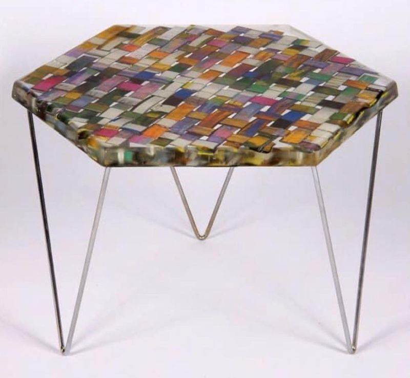 Akeredolu's recycled table designed will a teen at AFH