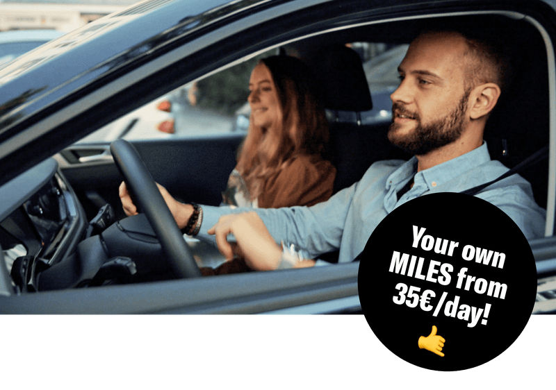 young-couple-driving-miles-daily-rates