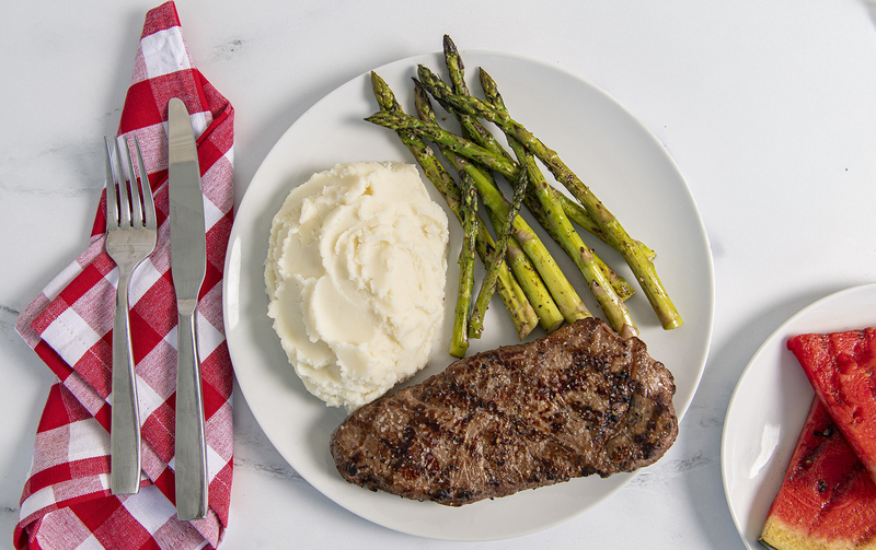 New York Strip Steak with Asparagus, Grilled Watermelon and Idahoan Buttery Homestyle Mashed Potatoes