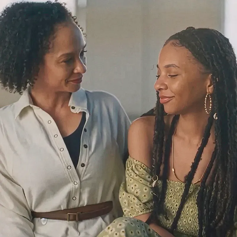 Mother facing her daughter and smiling, from the MassiveMusic Dove campaign