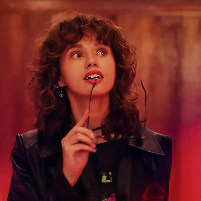 Woman in dramatic red lighting, from the Sound of Magnum ice cream campaign
