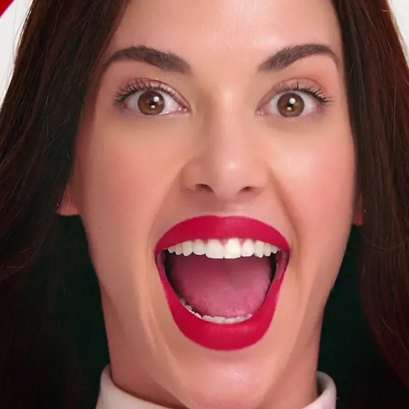 Portrait of a woman with an excited expression, from the Sound of Colgate campaign