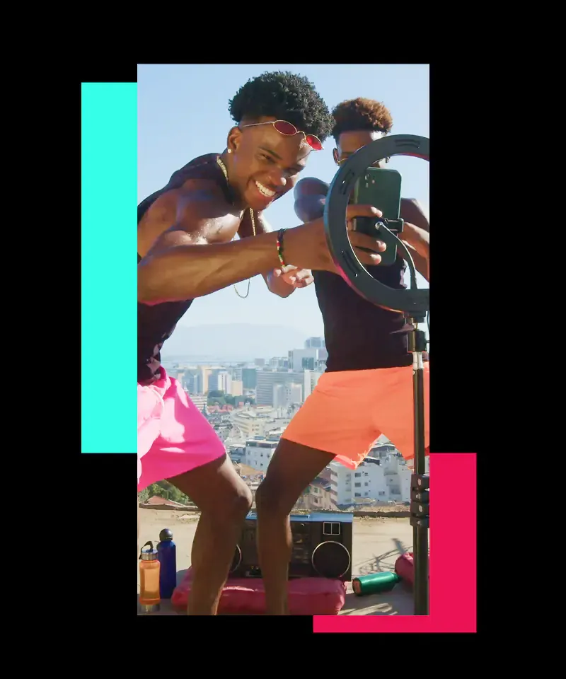 Dancer recording a rooftop video for TikTok