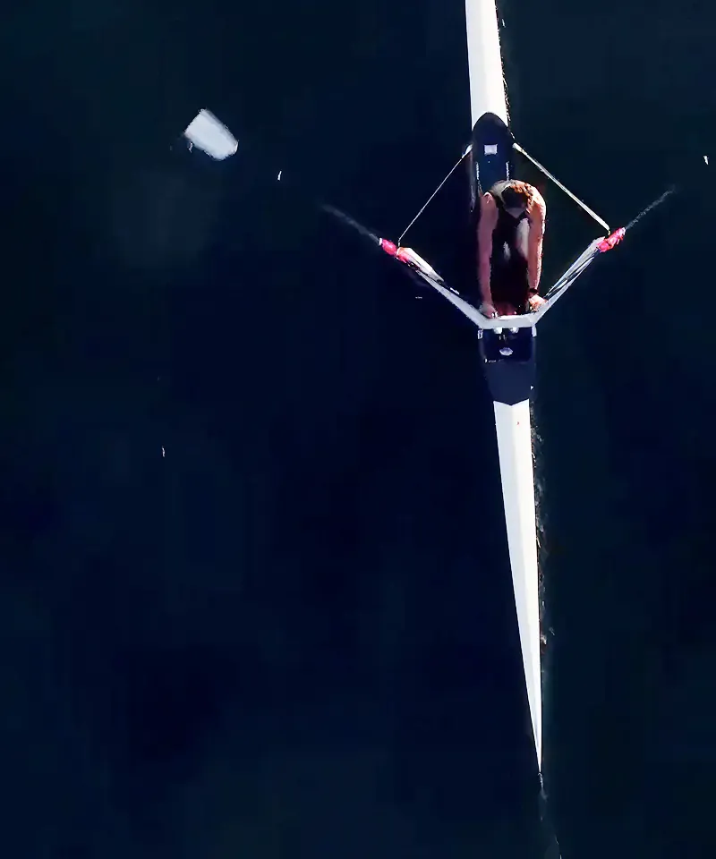 Aerial view of a rower on dark water, from the Sound of Samsung campaign