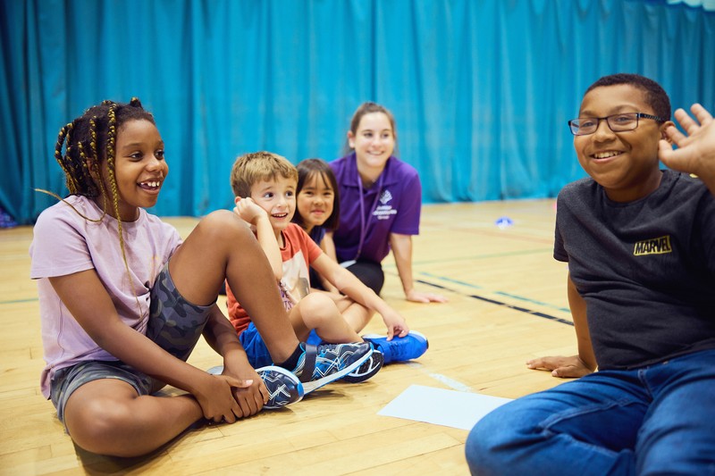 JAG staff and Children in a sports hall